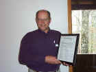 3/3/2002 - Founder Martin Cowen receives "thank you" plaque from fellow FOR members